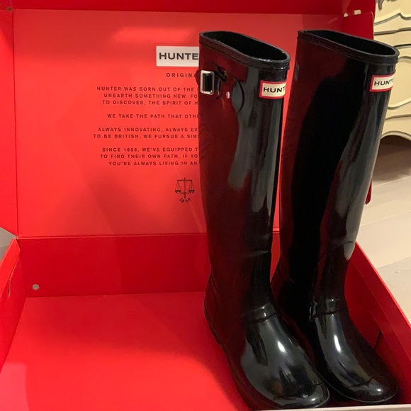 black shiny rain boots